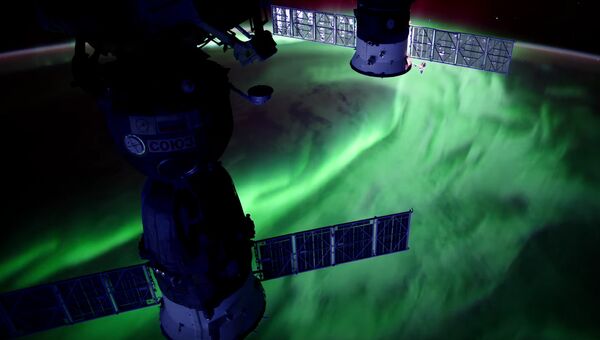 Полярное сияние на Земле снятое с Международной космической станции