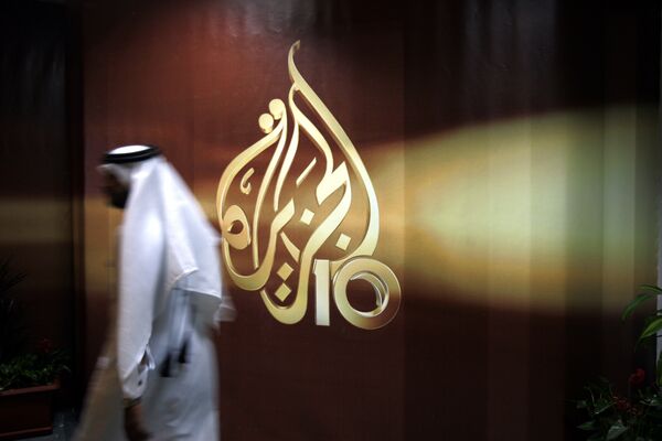 Сотрудник в офисе телекомпании Al Jazeera в Дохе, Катар Сотрудник в офисе телекомпании Al Jazeera в Дохе, Катар