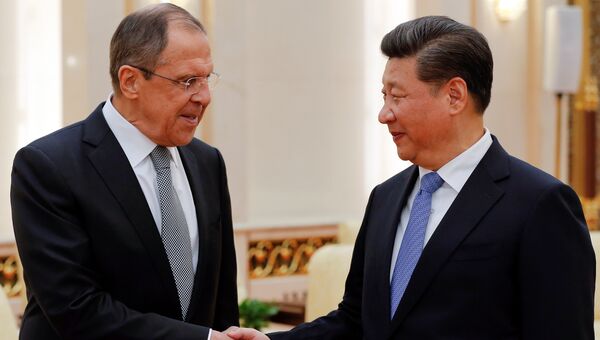 Глава МИД России Сергей Лавров во время встречи с председателем КНР Си Цзиньпином в Пекине, Китай. 28 апреля 2016