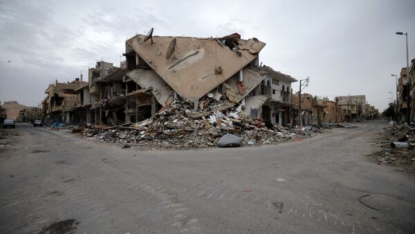 Разрушенные дома на одной из улиц Пальмиры. Архивное фото