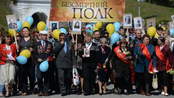Жители Киева во время акции Бессмертный полк. Архивное фото