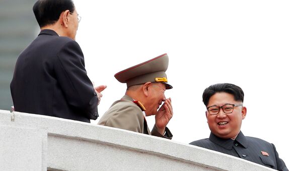 Северокорейский лидер Ким Чен Ын на митинге по случаю съезда ТПК в Пхеньяне