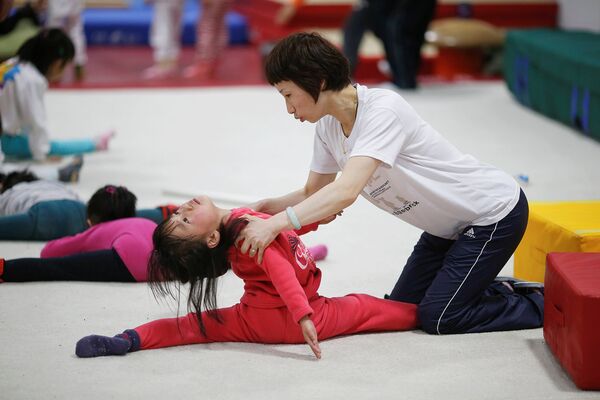 Занятия в олимпийской спортивной школе в Шанхае, Китай