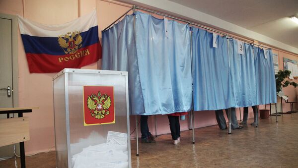Голосование на избирательном участке. Архивное фото