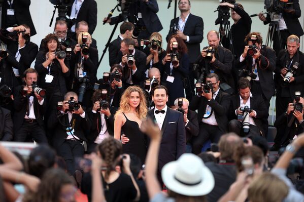 Голливудский актер Джонни Депп и актриса Эмбер Херд в Венеции, 2015 год