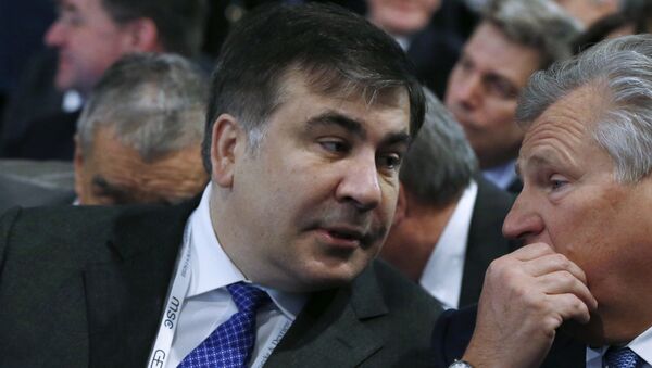 Губернатор Одесской области Михаил Саакашвили (слева)