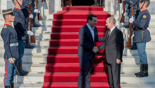 Президент России Владимир Путин и премьер-министр Греческой Республики Алексис Ципрас