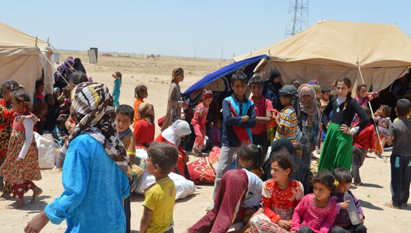 Жители Эль-Фаллуджи, покинувшие свои дома из-за столкновений, 26 мая 2016