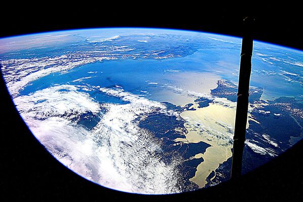 Вид Земли из космоса глазами космонавта Роскосмоса Юрия Маленченко
