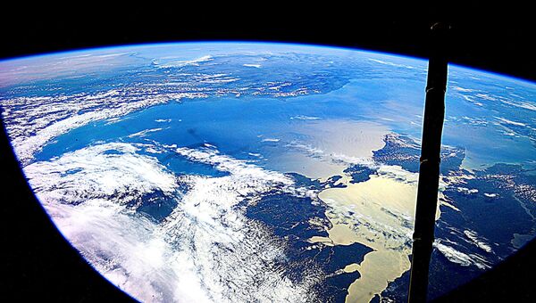 Вид земли из космоса глазами космонавта Роскосмоса Юрия Маленченко. Архивное фото