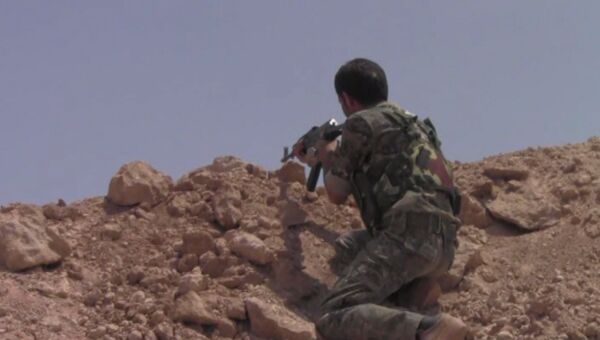 Наступление курдов на позиции боевиков ИГ в сирийском городе Манбидж