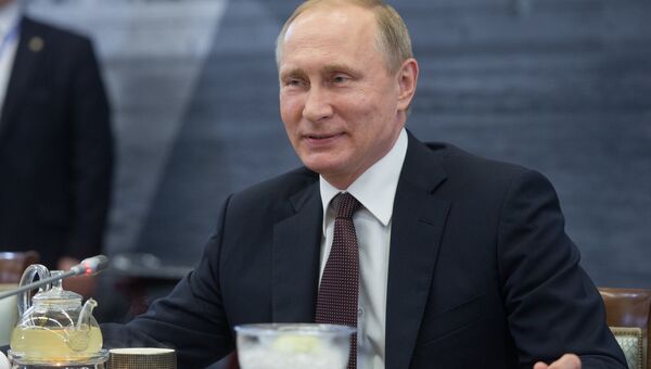 Президент России Владимир Путин во время встречи с руководителями крупнейших мировых информационных агентств