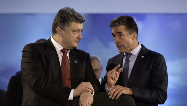 Президент Украины Петр Порошенко и бывший генсек НАТО Андерс фог Расмуссен