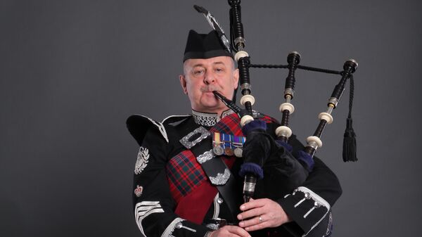 Музыкальный руководитель Кельтского сводного оркестра волынок и барабанов Дэвид Джонстон