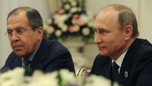 Президент РФ Владимир Путин и министр иностранных дел РФ Сергей Лавров. Архивное фото