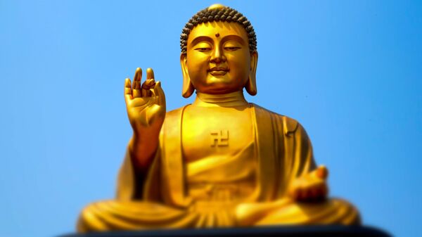 Позолоченная статуя Будды. Архивное фото