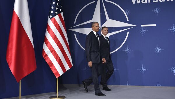 Президент США Барак Обама и президент Польши Анджей Дуда во время саммита НАТО в Варшаве. 8 июля 2016