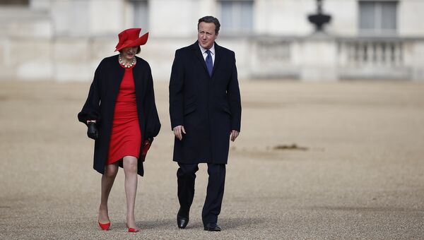 Британские политики Тереза Мэй и Дэвид Кэмерон