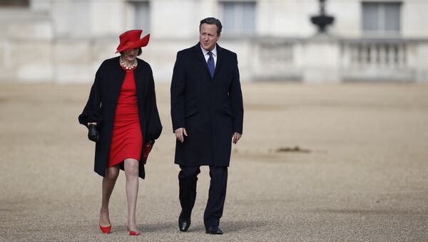 Британские политики Тереза Мэй и Дэвид Кэмерон