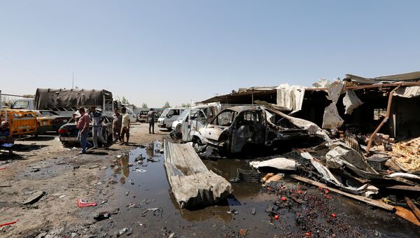Последствия теракта в окрестностях Багдада, Ирак