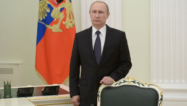Президент РФ В.Путин . Архивное фото