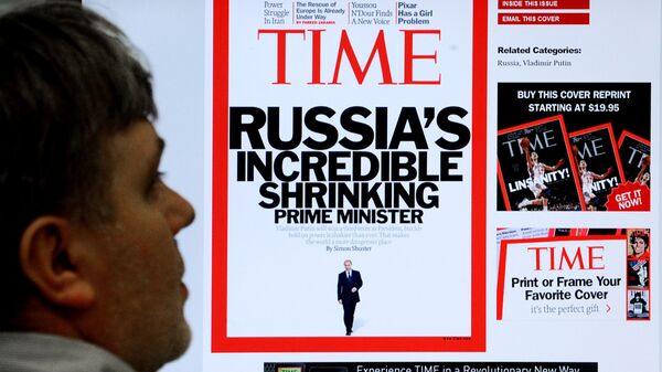 Обложка журнала Time на экране монитора