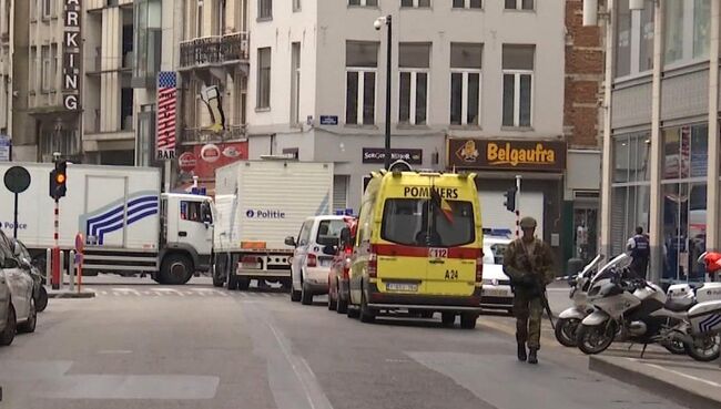 Военный недалеко от места нахождения предполагаемого террориста в Брюсселе, Бельгия. 20 июля 2016