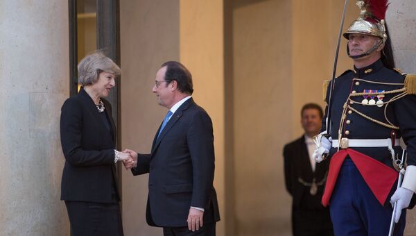 Встреча премьер-министра Великобритании Терезы Мэй и президента Франции Франсуа Олланда. 21 июля 2016