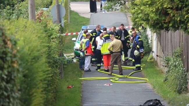 Полиция оцепила место взрыва чемодана возле центра беженцев в Цирндорфе