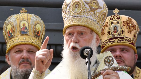 Глава Украинской православной церкви Киевского патриархата патриарх Филарет во время молебна в рамках крестного хода Украинской православной церкви в Киеве. 28 июля 2016 года