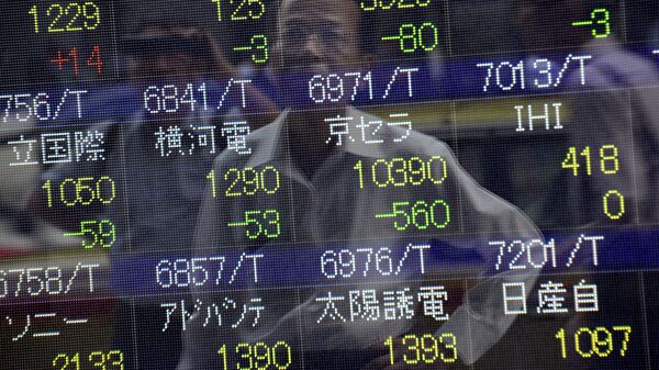 Табло Токийской фондовой биржи. Архивное фото