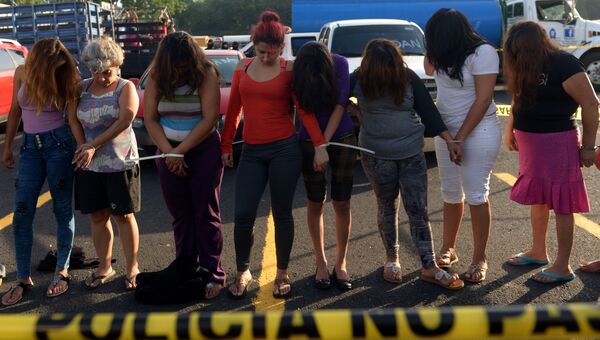 Задержанные члены банды Mara Salvatrucha (MS) в Сальвадоре. 28 июля 2016