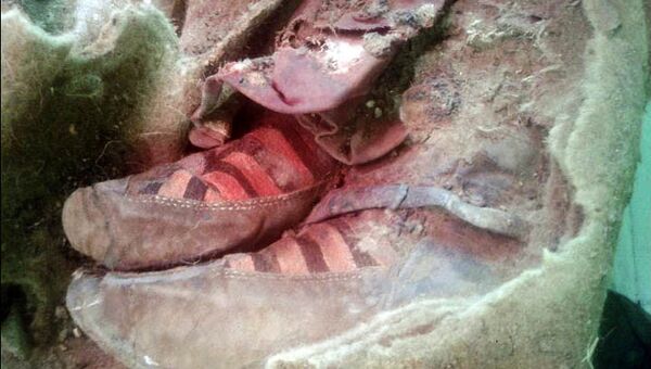 Археологи обнаружили в горах Алтая мумию в кроссовках