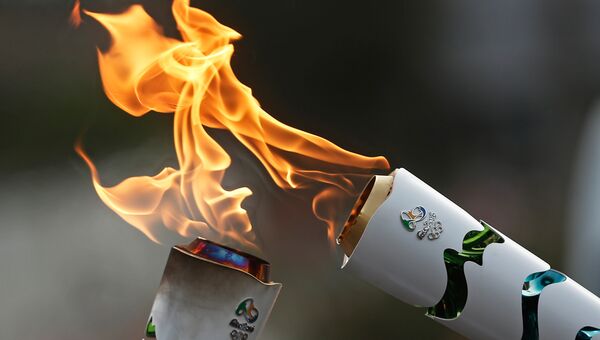 Факелы с Олимпийским огнем, штат Баия, Бразилия, 19 мая 2016