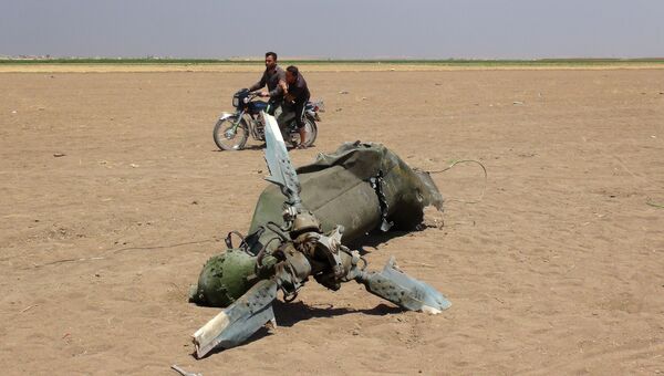 Обломки российского вертолета Ми-8, который был сбит в провинции Идлиб на севере Сирии. 1 августа 2016