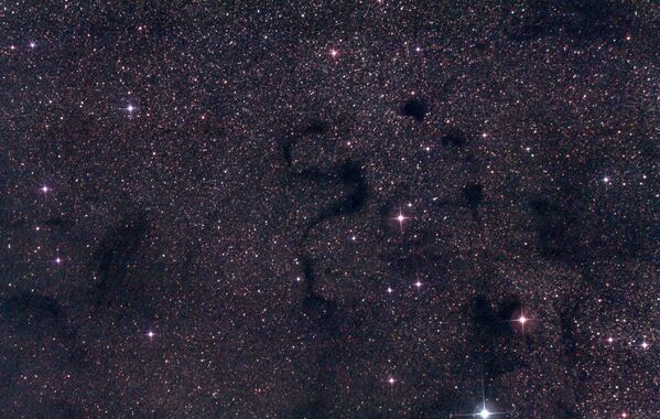 Туманность Barnard 72 в созвездии Змееносца