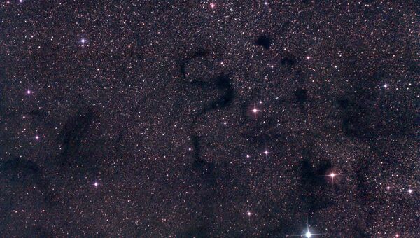Туманность Barnard 72 в созвездии Змееносца
