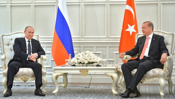 Президент России Владимир Путин (слева) и президент Турции Реджеп Тайип Эрдоган. Архивное фото