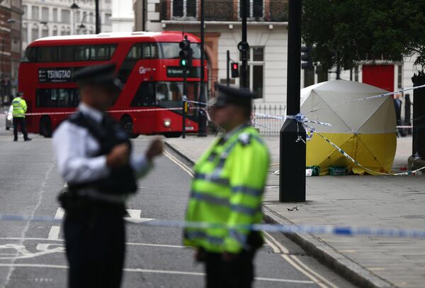Сотрудники правоохранительных органов на месте происшествия на Рассел-сквер в Лондоне, Великобритания. 4 августа 2016