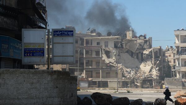 Обстрел боевиками одного из районов города Алеппо. Архивное фото