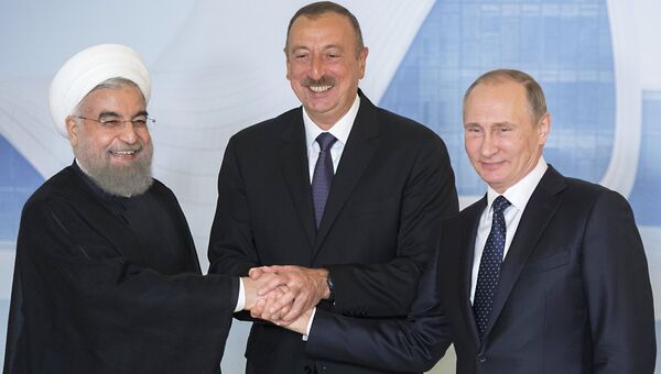 Президент России Владимир Путин, президент Азербайджанской Республики Ильхам Алиев и президент Исламской Республики Иран Хасан Рухани. Архивное фото