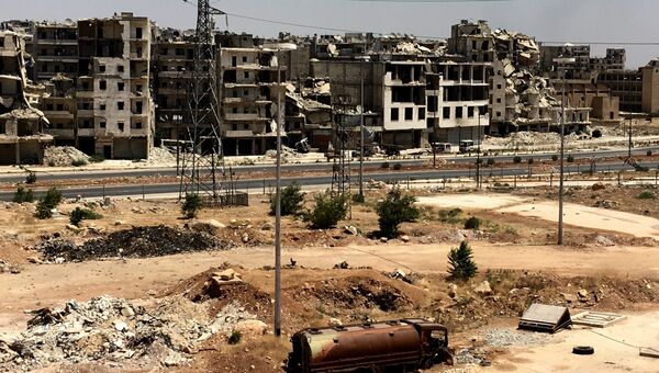 Разрушенные здания в районе Рамусе на юге города Алеппо в Сирии. Архивное фото