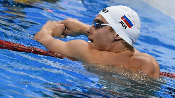 Владимир Морозов (Россия) после полуфинального заплыва на 100 м вольным стилем во время соревнований по плаванию среди мужчин на XXXI летних Олимпийских играх