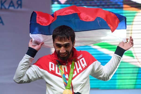 Российский дзюдоист Хасан Халмурзаев, завоевавший золотую медаль в мужском турнире по дзюдо