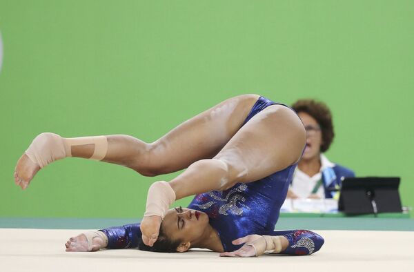Элисса Дауни из Великобритании во время квалификации по гимнастике на летних Олимпийских играх в Рио-де-Жанейро