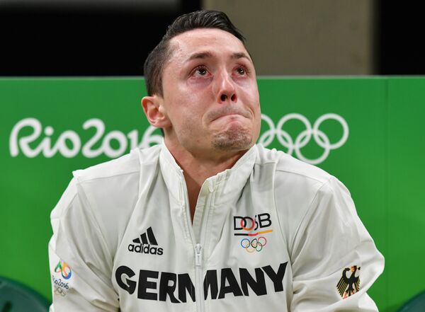 Спортсмен из Германии Андреас Тоба во время квалификации на спортивной гимнастике среди мужчин на Олимпийских играх в Рио-де-Жанейро