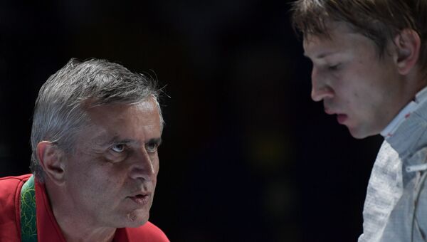 Старший тренер сборной России по фехтованию Кристиан Бауэр и Николай Ковалев на XXXI летних Олимпийских играх