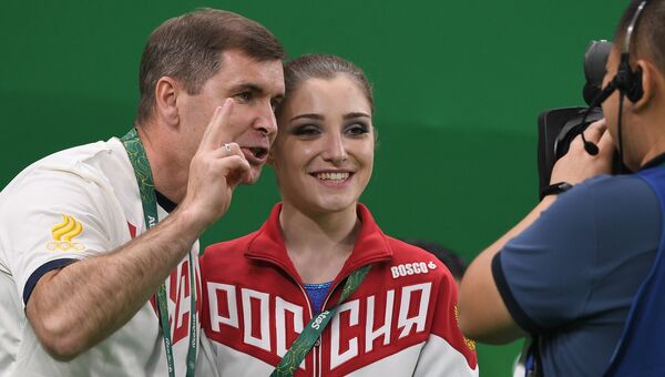 Алия Мустафина после выступления в индивидуальном многоборье по спортивной гимнастике на XXXI летних Олимпийских играх