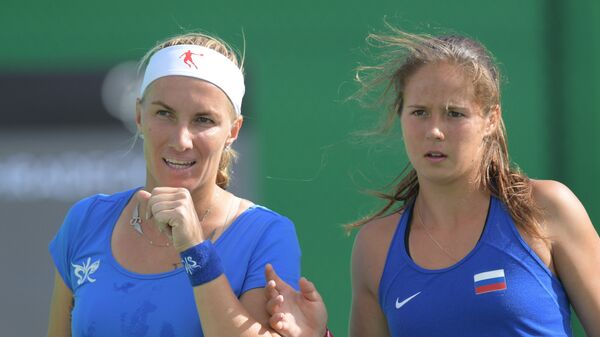 Светлана Кузнецова и Дарья Касаткина в матче 1/4 финала в парном разряде по теннису на XXXI летних Олимпийских играх