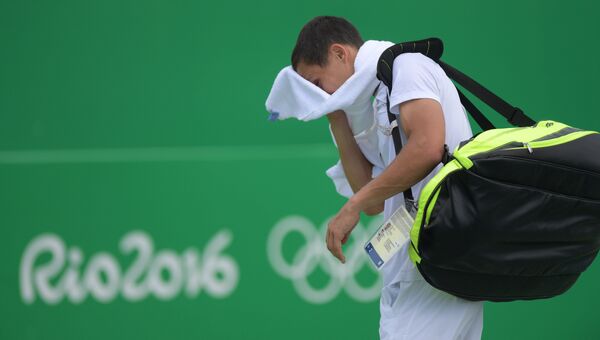 Российский теннисист Евгений Донской после матча третьего круга против Стива Джонсона (США) на XXXI летних Олимпийских играх